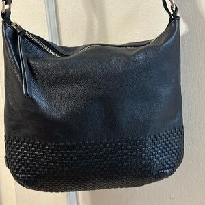 Cole Haan Black Leather Crossbody bag with a woven bottom